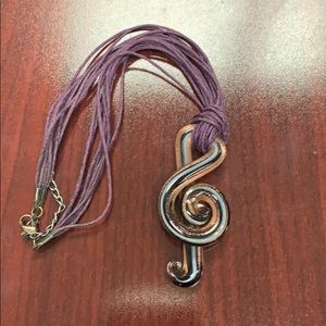 Glass treble clef charm necklace